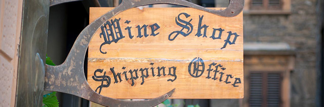 Close up of signage at a tasting room - Wine Shipping Office.