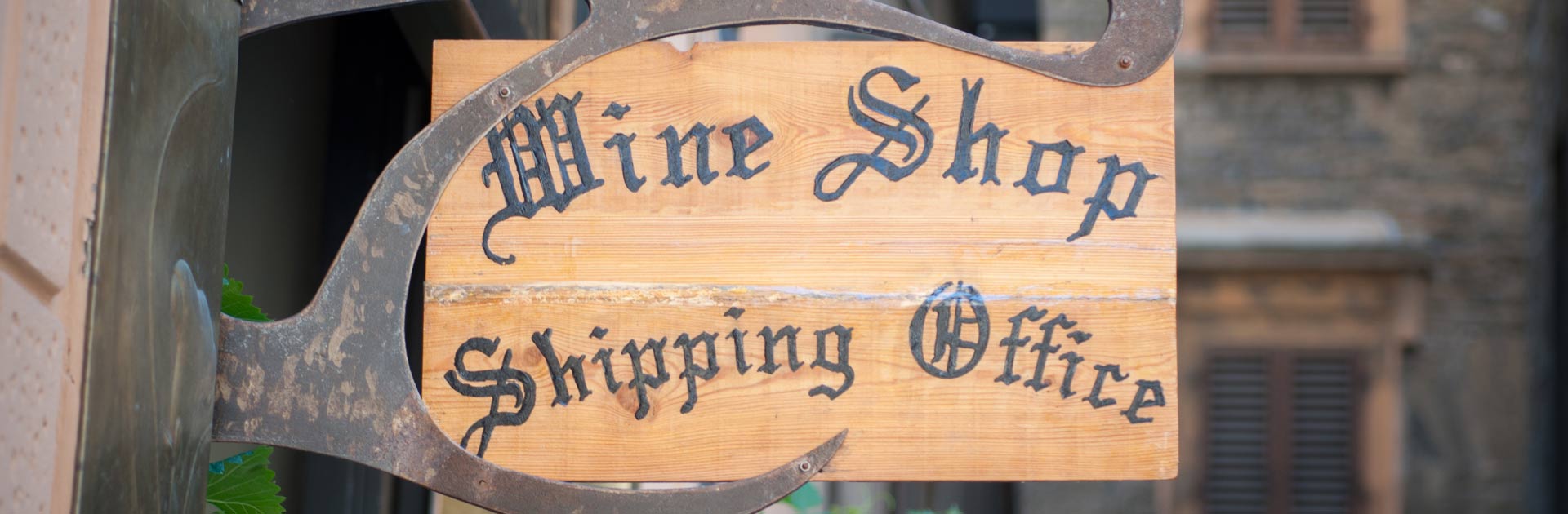 Close up of signage at a tasting room - Wine Shipping Office.